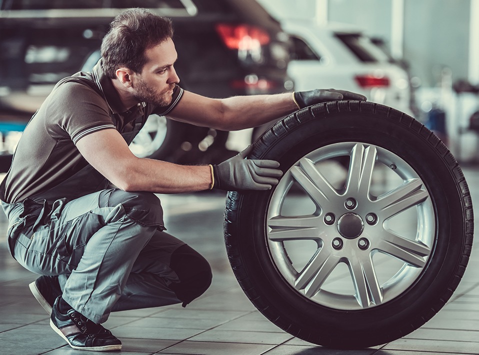 Mechanic looking a tyre - Tyres Middlesbrough